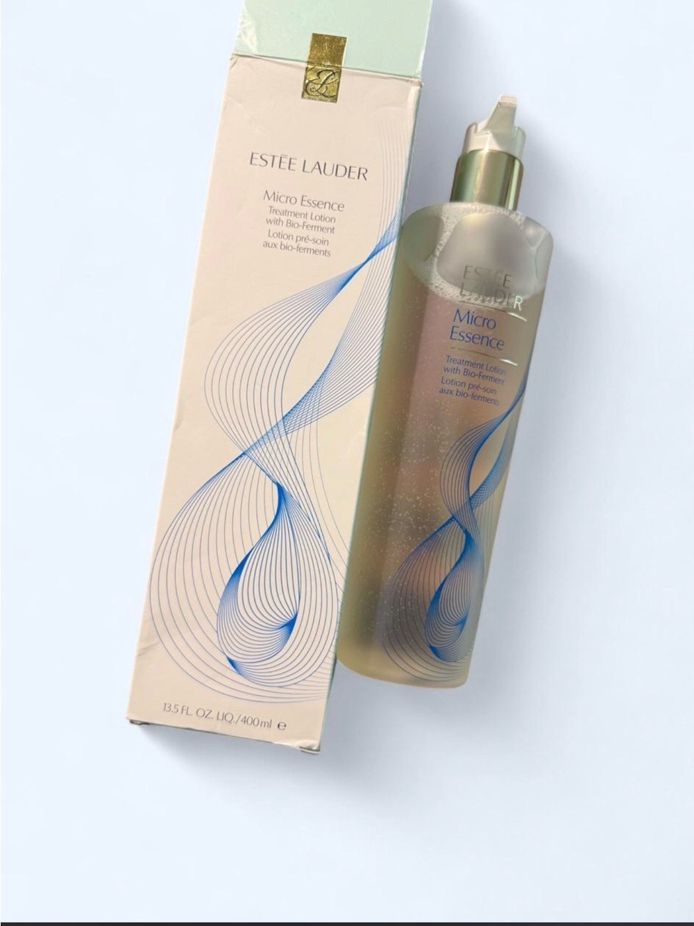 Estee Lauder Micro Essence Treatment Lotion — Cream with Blue Accents